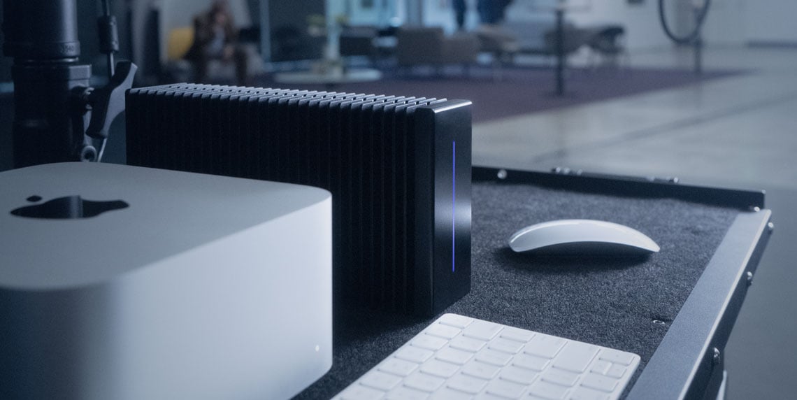 close up of the thunderblade x12 and a mac on a DIT cart