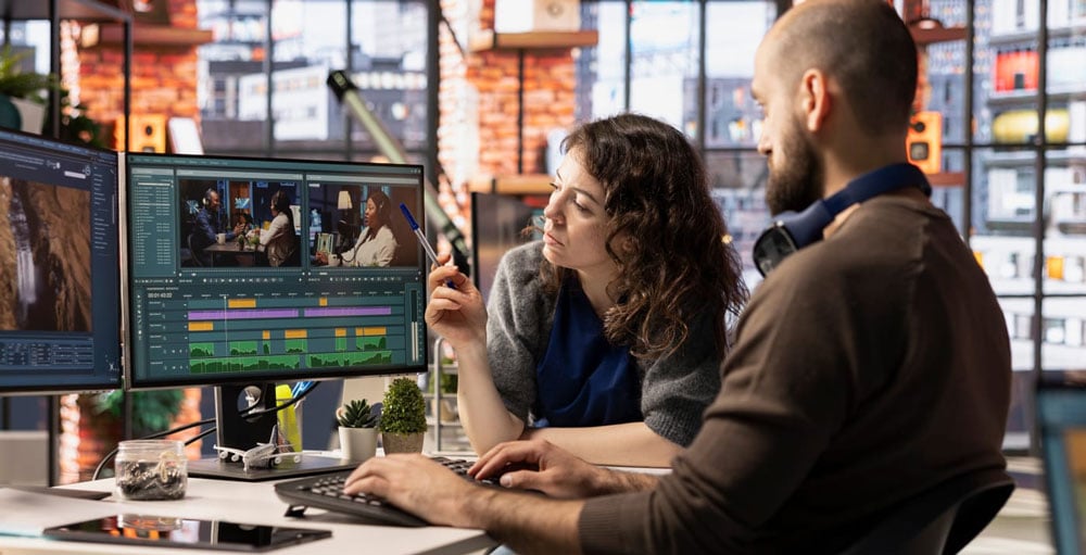 two people working with the owc ethernet adapter