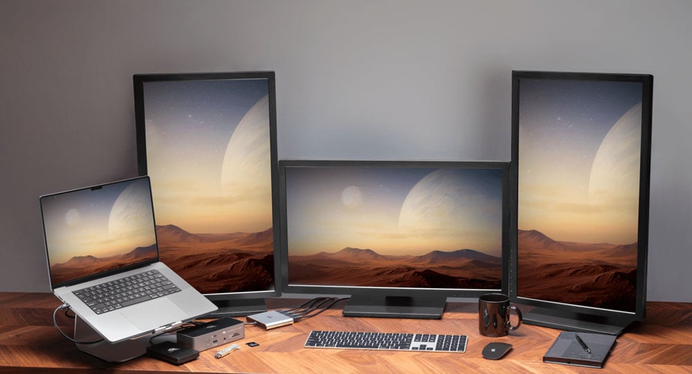 laptop connected to the OWC usb c adapter and monitors