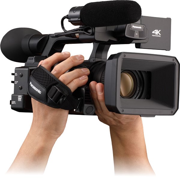 angled view of someone holding the panasonic camcorder
