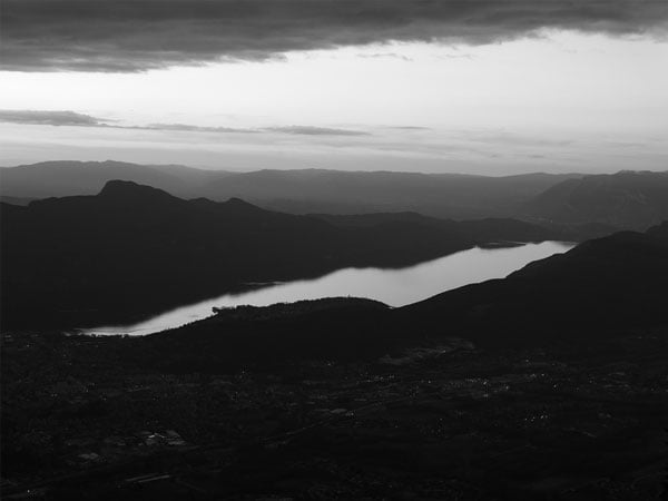 monochrome sample image of a town near a river