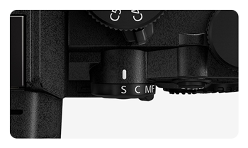 close up of the Panasonic LUMIX S1II focus mode lever