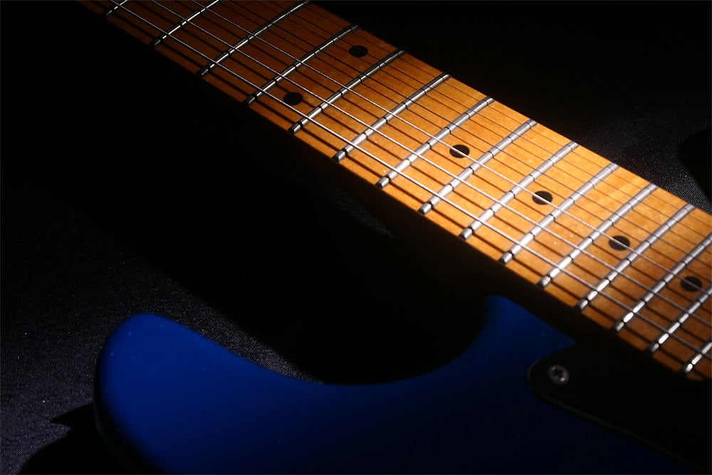 sample close up of a blue guitar