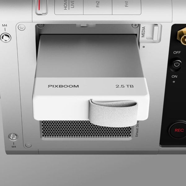 storage drive being inserted into the pixboom camera