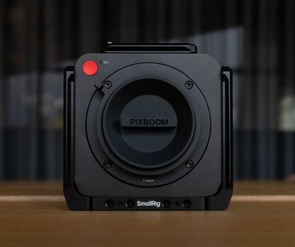 pxboom camera on a desk in a camera cage