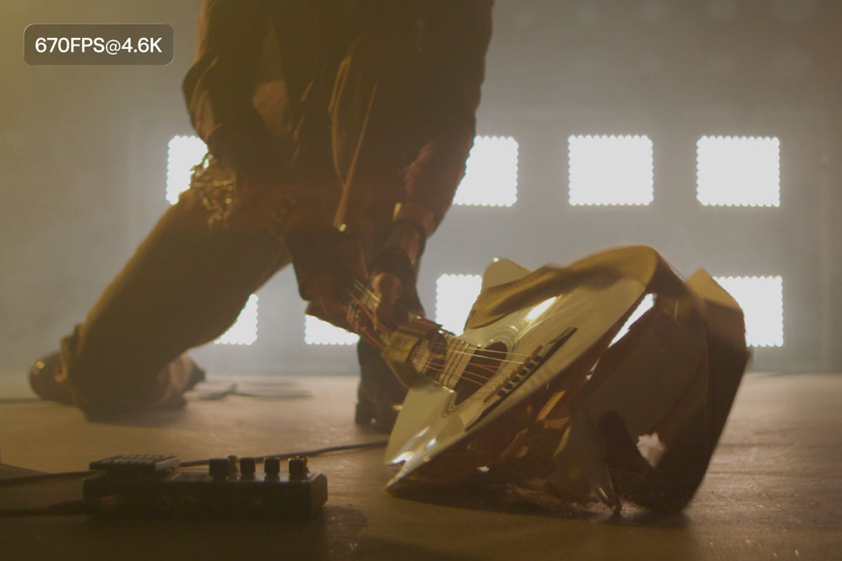 comparison of frame rates and aspect ratios of someone smashing a guitar on the ground