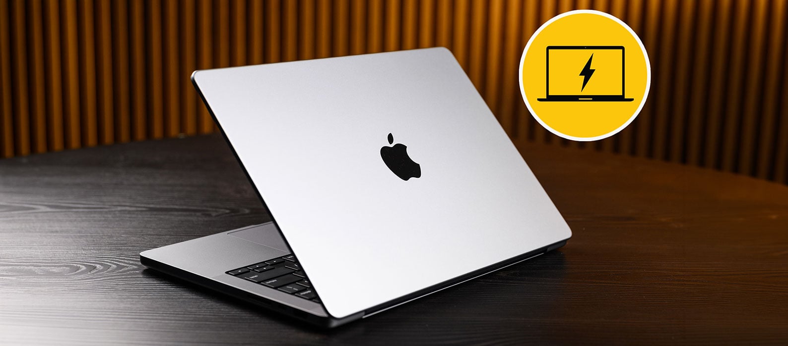 Sonnet Echo 13 Thunderbolt 5 SSD Dock charging a silver Apple MacBook Pro