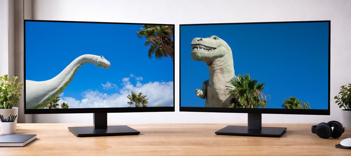 two monitors on a wooden desk showing footage from the thunderbolt 5 dock