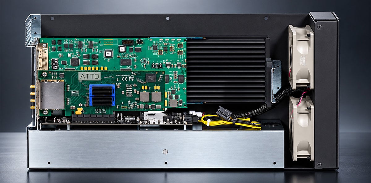 side view of the Sonnet Echo III T5 Deaktop open on a metal background