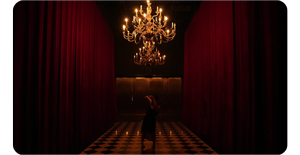 Sony Alpha 7S III Sample photo of dimly lit corridor with Red fabric and chandelier
