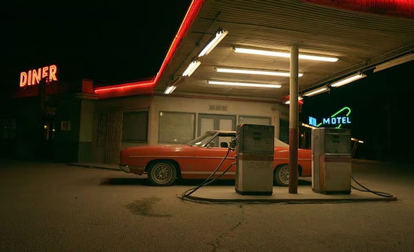 sample image of a car filling at a petrol station with a diner attached