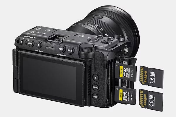 rear view of the sony fx5 with memory cards being inserted