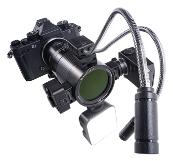 100mm F2.8 Macro X2 Lens with accessories attached with the cold shoe mount