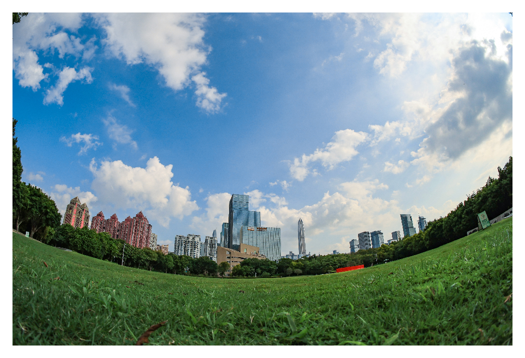 sample image of a view of a city skyline from the ground taken with the ttartisan fisheye lens