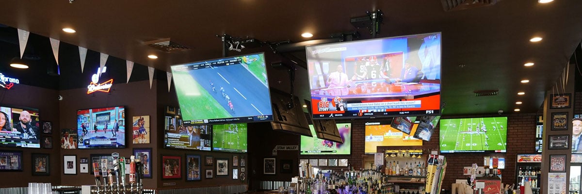 Turtle AV Darwin 4K being used on multiple screens within a sports bar