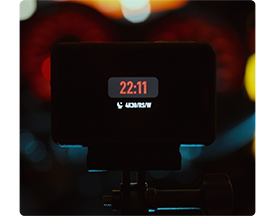 underwater photograph of diver holding DJI osmo action 5 pro recording video