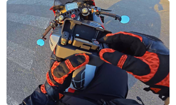 motorbike rider holding DJI Mic kit 