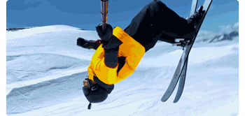 animation of skiier wearing bright yellow jacket  performing backflip