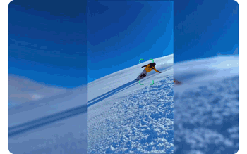 Animated gif of snowboarder going down snow covered mountain