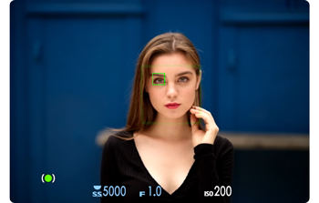 image preview from Fujifilm camera showing young brunette woman looking down lense with AF bracket surrounding her eye