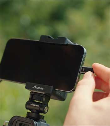 person plugging into iPhone