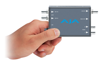 image of person holding AJA Mini Converter 