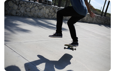 close up of a skateboarder in mid air taken with the canon ef 50mm lens