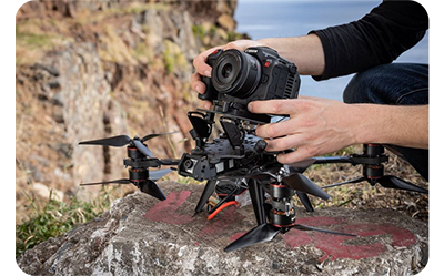 the canon r5 c attached to a drone