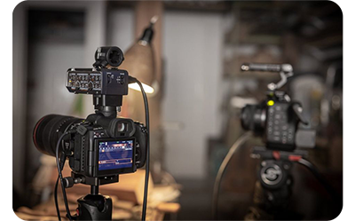 canon r5 c with mic attached to the top in a studio