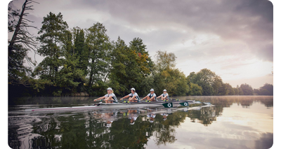 image of people rowing a boat down a river taken with the canon rf 24