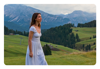 sample image of a woman in a field taken with the dji air 3s