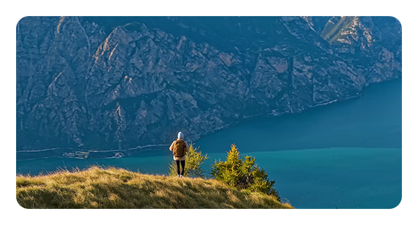 example image taken with the dji air 3s of a man on a cliffside
