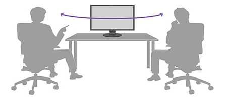 illustration of two silhouettes sat at a desk looking at Eizo CS2740