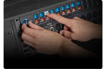 Person using stream deck studio rotary encoder and button controls