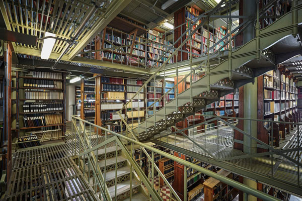 hasselblad XCD 20-35E lens sample image of metal stair case surrounded by library book shelves floor to ceiling