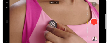 image of hollyland lark m2 microphone clipped onto dancers top