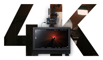 hdmi receiver connected to a monitor with 4K wrote behind them