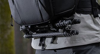 tripod attached to the bottom of the pgytech onemo 2 camera backpack