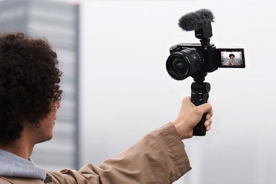 someone holding the sony zv e1 vlog camera