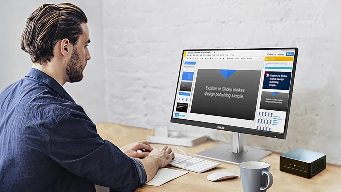 ASUS NUC Mini PC in business environment showing compact design